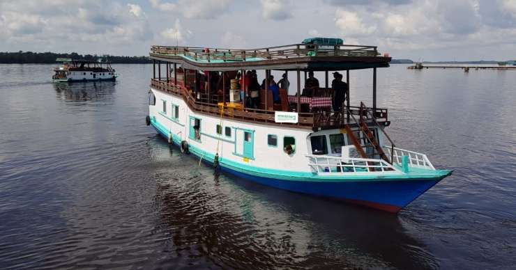 Explore Indonesia to Orangutan houseboat cruise tour, continue doing Java Bali vacation trip 15D